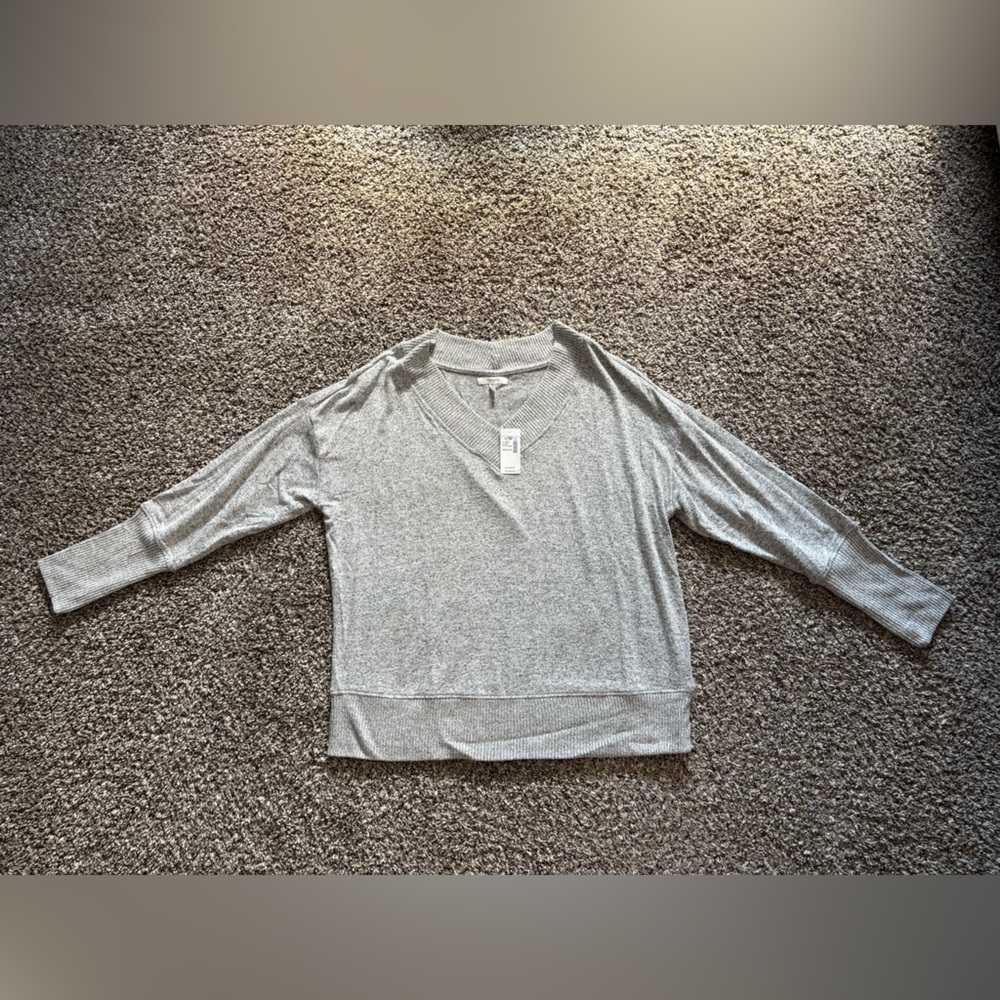 Maurice’s gray sweater
